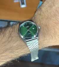 کاسیو الدمانی گرد گاد فادر مردانه نقره ای سبز | درجه یک CASIO