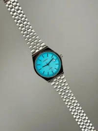 کاسیو الدمانی گرد گاد فادر مردانه نقره ای آبی تیفانی | درجه یک CASIO