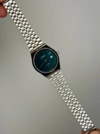 کاسیو الدمانی گرد گاد فادر مردانه نقره ای سبز | درجه یک CASIO